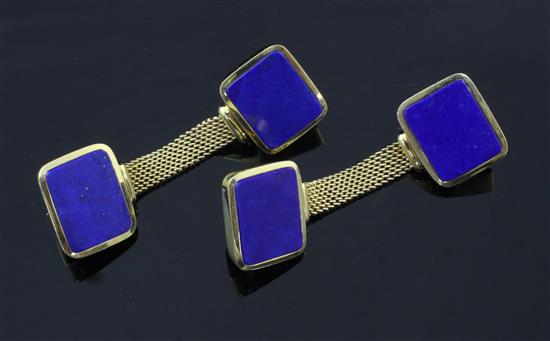 A pair of 1950s 18ct gold and lapis lazuli set cufflinks, overall length 2.25in.